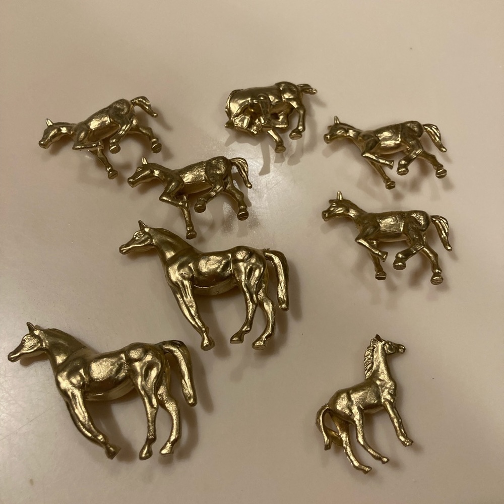 Small gold horses